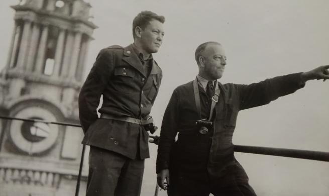 A black and white photograph of Richard Wakelin on the roof of St Paul's