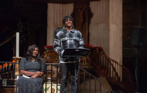 Musician Guvna B speaking at St Paul's Cathedral with Chine McDonald alongside