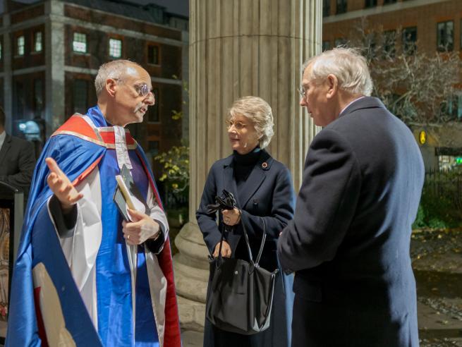 dean clergy speaking smiling