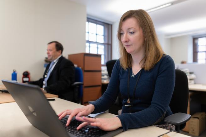 staff working at desks in chapter house