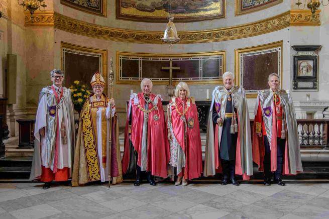 Their Majesties The King and Queen with the Dean and Bishop of London at the OBE Service