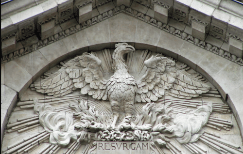 A photo of the phoenix carved above a door at the cathedral