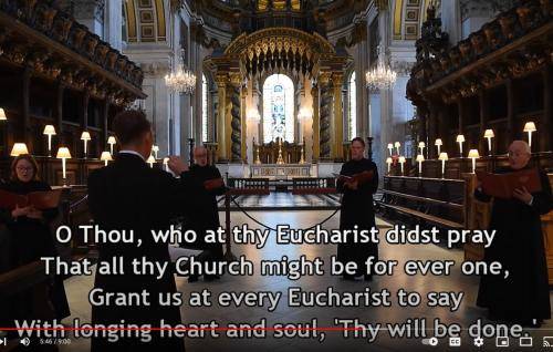 Members of the Vicars Choral singing in the Quire at St Paul's Cathedral