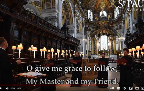 Members of the Vicars Choral singing in the Quire at St Paul's Cathedral