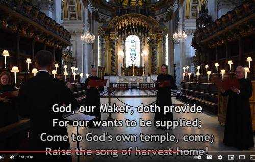 Members of the Vicars Choral singing in the Quire at St Paul's Cathedral