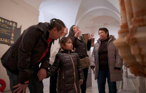 family exploring the crypt