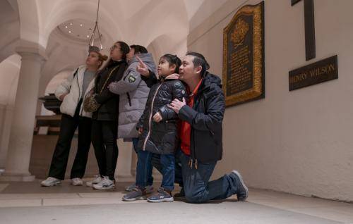 family exploring the crypt 