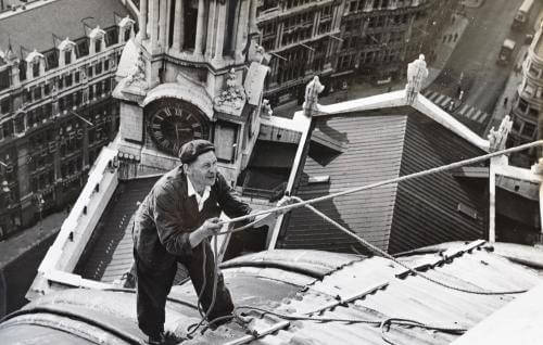 A Friend of St Paul's Cathedral working on the roof of the building