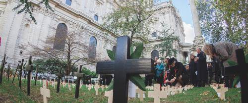 The Garden of Remembrance, with crosses and poppies, is shown in the foreground with the Cathedral behind