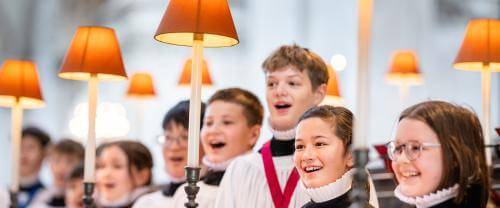 Boy and girl choristers singing in the quire